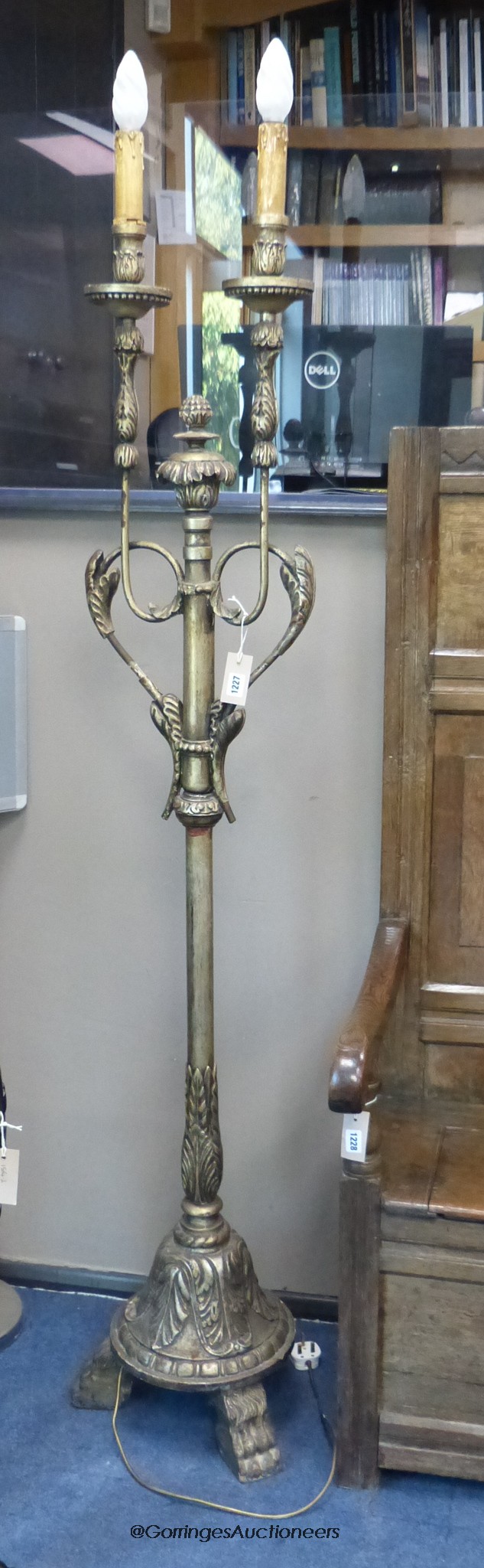 A pair of 20th century decorative silvered wood and wrought iron twin-branch candlestands